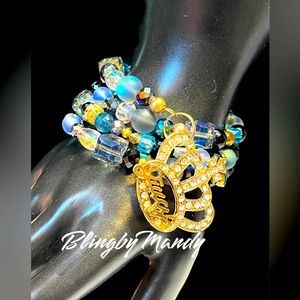 👑Coiled memory bracelet with large goddess charm/crown says Juicy